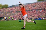 12 May 2024; Shane McPartlan of Armagh celebrates scoring in the penalty shoot-out of the Ulster GAA Football Senior Championship final match between Armagh and Donegal at St Tiernach's Park in Clones, Monaghan. Photo by Ramsey Cardy/Sportsfile