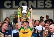 12 May 2024; Odhran Doherty of Donegal lifts the Anglo Celt Cup after the Ulster GAA Football Senior Championship final match between Armagh and Donegal at St Tiernach's Park in Clones, Monaghan. Photo by Ramsey Cardy/Sportsfile