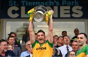 12 May 2024; Jason McGee of Donegal lifts the Anglo Celt Cup after the Ulster GAA Football Senior Championship final match between Armagh and Donegal at St Tiernach's Park in Clones, Monaghan. Photo by Ramsey Cardy/Sportsfile