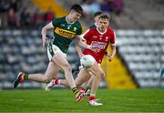 13 May 2024; Ben Murphy of Kerry in action against Harry Cogan of Cork during the Electric Ireland Munster GAA Football Minor Championship Final match between Cork and Kerry at Páirc Ui Rinn in Cork. Photo by Brendan Moran/Sportsfile