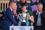 13 May 2024; Kerry captain Ben Murphy is presented with the cup by Munster Council vice-chairman Tim Murphy after the Electric Ireland Munster GAA Football Minor Championship Final match between Cork and Kerry at Páirc Ui Rinn in Cork. Photo by Brendan Moran/Sportsfile