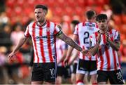 10 May 2024; Patrick McEleney, left, and Adam O'Reilly of Derry City after the SSE Airtricity Men's Premier Division match between Derry City and Bohemians at The Ryan McBride Brandywell Stadium in Derry. Photo by Ramsey Cardy/Sportsfile