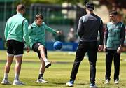 14 May 2024; Ireland players, including Curtis Campher, second from left, warm up before match three of the Floki Men's T20 International Series between Ireland and Pakistan at Castle Avenue Cricket Ground in Dublin. Photo by Sam Barnes/Sportsfile
