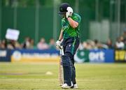 14 May 2024; Ross Adair of Ireland departs the field after being bowled by Shaheen Shah Afridi of Pakistan during match three of the Floki Men's T20 International Series between Ireland and Pakistan at Castle Avenue Cricket Ground in Dublin. Photo by Sam Barnes/Sportsfile