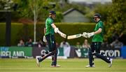 14 May 2024;Harry Tector, left, and Lorcan Tucker of Ireland touch bats during match three of the Floki Men's T20 International Series between Ireland and Pakistan at Castle Avenue Cricket Ground in Dublin. Photo by Sam Barnes/Sportsfile