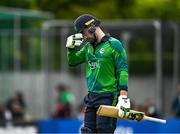 14 May 2024; Andrew Balbirnie of Ireland departs after being caught by Mohammad Rizwan of Pakistan during match three of the Floki Men's T20 International Series between Ireland and Pakistan at Castle Avenue Cricket Ground in Dublin. Photo by Sam Barnes/Sportsfile
