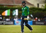 14 May 2024; Andrew Balbirnie of Ireland departs after being caught by Mohammad Rizwan of Pakistan during match three of the Floki Men's T20 International Series between Ireland and Pakistan at Castle Avenue Cricket Ground in Dublin. Photo by Sam Barnes/Sportsfile