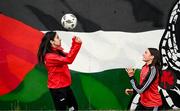 14 May 2024; Palestine's Mira Natour and Robyn Baird of Bohemians during a photocall ahead of the International Solidarity Match between Bohemians women's team and Palestine women's team to be played on Wednesday, May 15, at Dalymount Park in Dublin. Photo by Stephen McCarthy/Sportsfile