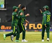 14 May 2024; Mohammad Amir of Pakistan, celebrates with team-mates Saim Ayub, left, and Hasan Ali after catching out George Dockrell of Ireland during match three of the Floki Men's T20 International Series between Ireland and Pakistan at Castle Avenue Cricket Ground in Dublin. Photo by Sam Barnes/Sportsfile