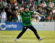 14 May 2024; Curtis Campher of Ireland fields the ball during match three of the Floki Men's T20 International Series between Ireland and Pakistan at Castle Avenue Cricket Ground in Dublin. Photo by Sam Barnes/Sportsfile