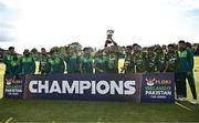 14 May 2024; Pakistan players celebrate with the trophy after winning match three and the Floki Men's T20 International Series between Ireland and Pakistan at Castle Avenue Cricket Ground in Dublin. Photo by Sam Barnes/Sportsfile