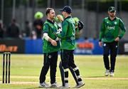 14 May 2024; Ireland players Curtis Campher, left, and Lorcan Tucker embrace after their side's defeat in match three of the Floki Men's T20 International Series between Ireland and Pakistan at Castle Avenue Cricket Ground in Dublin. Photo by Sam Barnes/Sportsfile