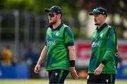 14 May 2024; Mark Adair, left, and Ben White of Ireland dejected after their side's defeat in match three of the Floki Men's T20 International Series between Ireland and Pakistan at Castle Avenue Cricket Ground in Dublin. Photo by Sam Barnes/Sportsfile