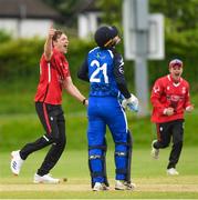 15 May 2024; Josh Manley of Munster Reds celebrates after taking the wicket of Philippe Le Roux of Leinster Lightning during the Inter-Provincial IP50 Cup match between Leinster Lightning and Munster Reds at Sydney Parade, Sandymount in Dublin. Photo by Matt Browne/Sportsfile