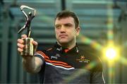 15 May 2024; (EDITORS NOTE: A special effects camera filter was used for this image.) PwC GAA/GPA Player of the Month for April in hurling, Shane O’Donnell of Clare, with his award at PwC offices in Dublin. Photo by Sam Barnes/Sportsfile