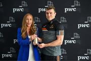 15 May 2024; PwC GPA Player of the Month for April in hurling, Shane O'Donnell of Clare, is presented with his award by Global ETF Leader and Partner at PwC Ireland Marie Coady at PwC’s offices in Dublin. Photo by Sam Barnes/Sportsfile