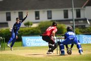 15 May 2024; Gavin Hoey of Leinster Lightning bowls to Alistair Frost of Munster Reads during the Inter-Provincial IP50 Cup match between Leinster Lightning and Munster Reds at Sydney Parade, Sandymount in Dublin. Photo by Matt Browne/Sportsfile