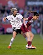 15 May 2024; Jennifer Shattara of Palestine is tackled by Shauna Carroll of Bohemians during the international solidarity match between Bohemians and Palestine at Dalymount Park in Dublin. Photo by Shauna Clinton/Sportsfile