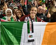 15 May 2024; Sara Alshakhshir of Palestine with supporters after the international solidarity match between Bohemians and Palestine at Dalymount Park in Dublin. Photo by Stephen McCarthy/Sportsfile