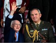 15 May 2024; President of Ireland Michael D Higgins and Commandant Brian Walsh, aide-de-camp to the President of Ireland, during the international solidarity match between Bohemians and Palestine at Dalymount Park in Dublin. Photo by Stephen McCarthy/Sportsfile