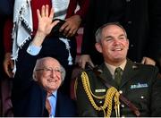 15 May 2024; President of Ireland Michael D Higgins and Commandant Brian Walsh, aide-de-camp to the President of Ireland, during the international solidarity match between Bohemians and Palestine at Dalymount Park in Dublin. Photo by Stephen McCarthy/Sportsfile