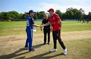 16 May 2024; Leinster Lightning captain Sam Harbinson and Munster Reds captain Joshua Manley shake hands watched by match referee Graham McCrea before the Inter-Provincial IP20 Trophy match between Leinster Lightning and Munster Reds at Sydney Parade, Sandymount in Dublin. Photo by Harry Murphy/Sportsfile