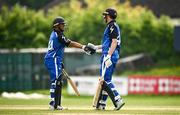 16 May 2024; Tim Tector of Leinster Lightning is congratulated by teammate Chris de Freitas after bring up his 50 during the Inter-Provincial IP20 Trophy match between Leinster Lightning and Munster Reds at Sydney Parade, Sandymount in Dublin. Photo by Harry Murphy/Sportsfile