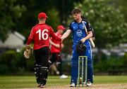 16 May 2024; Séamus Lynch of Leinster Lightning shakes hands with Oliver Metcalfe of Munster Reds after the Inter-Provincial IP20 Trophy match between Leinster Lightning and Munster Reds at Sydney Parade, Sandymount in Dublin. Photo by Harry Murphy/Sportsfile