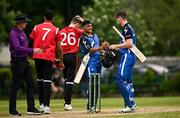 16 May 2024; Séamus Lynch of Leinster Lightning, right, shakes hands with teammate Chris de Freitas after the Inter-Provincial IP20 Trophy match between Leinster Lightning and Munster Reds at Sydney Parade, Sandymount in Dublin. Photo by Harry Murphy/Sportsfile