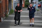 17 May 2024; St Patrick's Athletic manager Stephen Kenny accompanied by goalkeeping coach Pat Jennings, right, arrives for the SSE Airtricity Men's Premier Division match between St Patrick's Athletic and Derry City at Richmond Park in Dublin. Photo by Stephen McCarthy/Sportsfile