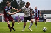 17 May 2024; Stephen Walsh of Galway United  in action against Andrew Quinn of Drogheda United during the SSE Airtricity Men's Premier Division match between Drogheda United and Galway United at Weavers Park in Drogheda, Louth.  Photo by Shauna Clinton/Sportsfile
