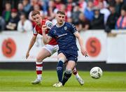 17 May 2024; Ronan Boyce of Derry City in action against Brandon Kavanagh of St Patrick's Athletic during the SSE Airtricity Men's Premier Division match between St Patrick's Athletic and Derry City at Richmond Park in Dublin. Photo by Stephen McCarthy/Sportsfile