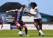 17 May 2024; Darragh Markey of Drogheda United in action against Al-Amin Kazeem of Galway United during the SSE Airtricity Men's Premier Division match between Drogheda United and Galway United at Weavers Park in Drogheda, Louth.  Photo by Shauna Clinton/Sportsfile