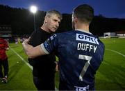 17 May 2024; St Patrick's Athletic manager Stephen Kenny with Michael Duffy of Derry City after the SSE Airtricity Men's Premier Division match between St Patrick's Athletic and Derry City at Richmond Park in Dublin. Photo by Stephen McCarthy/Sportsfile