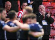 17 May 2024; Derry City media officer Lawrence Moore, right, applauds Derry City's goal scored by Paul McMullan during the SSE Airtricity Men's Premier Division match between St Patrick's Athletic and Derry City at Richmond Park in Dublin. Photo by Stephen McCarthy/Sportsfile