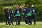 18 May 2024; Limerick players celebrate the taking of a wicket during the Cricket Ireland National Cup Round One match between Limerick and County Galway at The Manor Fields in Adare, Limerick. Photo by Tom Beary/Sportsfile
