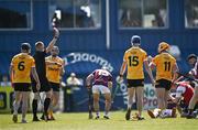 18 May 2024; Referee Michael Kennedy shows a red card to Ryan McGarry of Antrim, 6, during the Leinster GAA Hurling Senior Championship Round 4 match between Antrim and Galway at Corrigan Park in Belfast. Photo by Harry Murphy/Sportsfile
