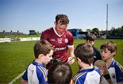 18 May 2024; Conor Whelan of Galway signs autographs after the Leinster GAA Hurling Senior Championship Round 4 match between Antrim and Galway at Corrigan Park in Belfast. Photo by Harry Murphy/Sportsfile