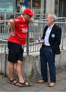 18 May 2024; Munster MEP Seán Kelly in conversation with Cork supporter Michael Crowley, from Timoleague, before the GAA Football All-Ireland Senior Championship Round 1 match between Clare and Cork at Cusack Park in Ennis, Clare. Photo by Ray McManus/Sportsfile