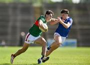 18 May 2024; Tommy Conroy of Mayo in action against Cian Reilly of Cavan during the GAA Football All-Ireland Senior Championship Round 1 match between Mayo and Cavan at Hastings Insurance MacHale Park in Castlebar, Mayo. Photo by Stephen Marken/Sportsfile