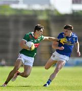 18 May 2024; Tommy Conroy of Mayo in action against Cian Reilly of Cavan during the GAA Football All-Ireland Senior Championship Round 1 match between Mayo and Cavan at Hastings Insurance MacHale Park in Castlebar, Mayo. Photo by Stephen Marken/Sportsfile