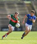 18 May 2024; Eoghan McLaughlin of Mayo in action against Oisin Kiernan of Cavan during the GAA Football All-Ireland Senior Championship Round 1 match between Mayo and Cavan at Hastings Insurance MacHale Park in Castlebar, Mayo. Photo by Stephen Marken/Sportsfile