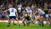 18 May 2024; Paudie Clifford of Kerry in action against Monaghan players, from left, Ryan Wylie, Stephen O’Hanlon and Joel Wilson during the GAA Football All-Ireland Senior Championship Round 1 match between Kerry and Monaghan at Fitzgerald Stadium in Killarney, Kerry. Photo by Brendan Moran/Sportsfile