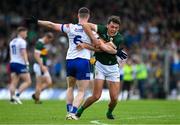 18 May 2024; David Clifford of Kerry is tackled by Killian Lavelle of Monaghan during the GAA Football All-Ireland Senior Championship Round 1 match between Kerry and Monaghan at Fitzgerald Stadium in Killarney, Kerry. Photo by Brendan Moran/Sportsfile