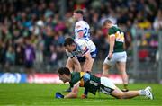 18 May 2024; Jason Irwin of Monaghan helps Paudie Clifford of Kerry up during the GAA Football All-Ireland Senior Championship Round 1 match between Kerry and Monaghan at Fitzgerald Stadium in Killarney, Kerry. Photo by Brendan Moran/Sportsfile