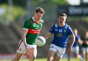 18 May 2024; Matthew Ruane of Mayo in action against Cian Madden of Cavan during the GAA Football All-Ireland Senior Championship Round 1 match between Mayo and Cavan at Hastings Insurance MacHale Park in Castlebar, Mayo. Photo by Stephen Marken/Sportsfile