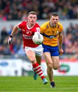 18 May 2024; Conor Corbett of Cork in action against Cillian Brennan of Clare during the GAA Football All-Ireland Senior Championship Round 1 match between Clare and Cork at Cusack Park in Ennis, Clare. Photo by Ray McManus/Sportsfile