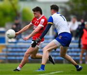 18 May 2024; Chris Óg Jones of Cork kicks a wide, under pressure from Clare goalkeeper Stephen Ryan, during the GAA Football All-Ireland Senior Championship Round 1 match between Clare and Cork at Cusack Park in Ennis, Clare. Photo by Ray McManus/Sportsfile