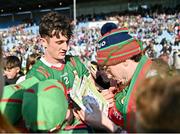 18 May 2024; Jack Coyne of Mayo signs a jersey after the GAA Football All-Ireland Senior Championship Round 1 match between Mayo and Cavan at Hastings Insurance MacHale Park in Castlebar, Mayo. Photo by Stephen Marken/Sportsfile