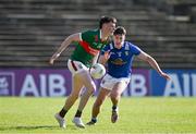 18 May 2024; Bob Tuohy of Mayo in action against Oisin Kiernan of Cavan during the GAA Football All-Ireland Senior Championship Round 1 match between Mayo and Cavan at Hastings Insurance MacHale Park in Castlebar, Mayo. Photo by Stephen Marken/Sportsfile